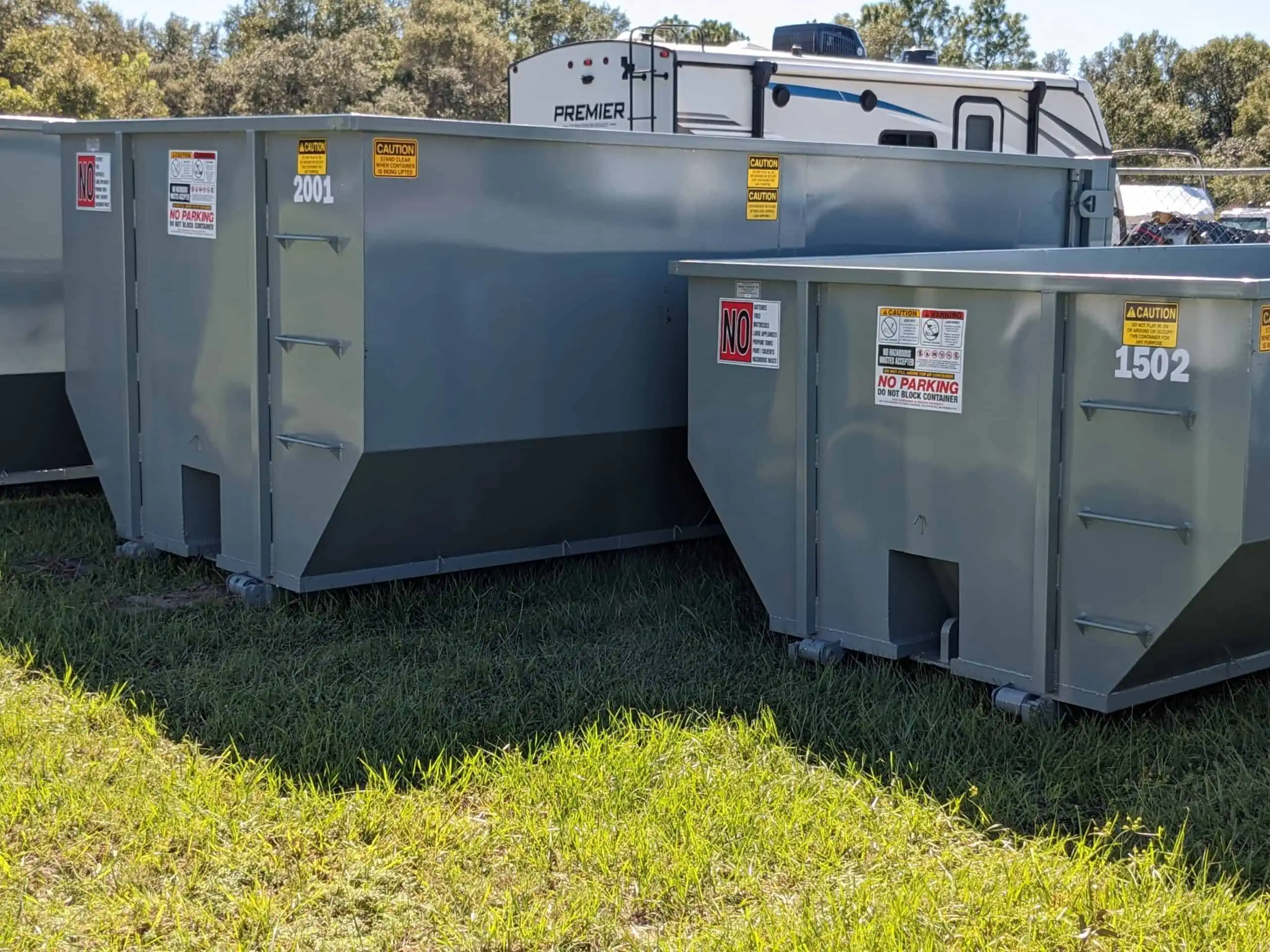  Multiple-sized dumpsters for waste management solutions by Yankee Dumpsters in Sorrento, FL.